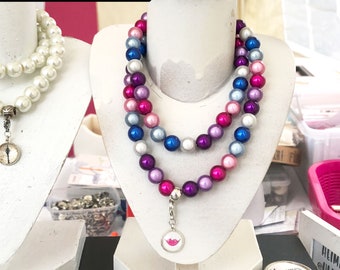 Pearl necklace in spring colors including a pendant loop