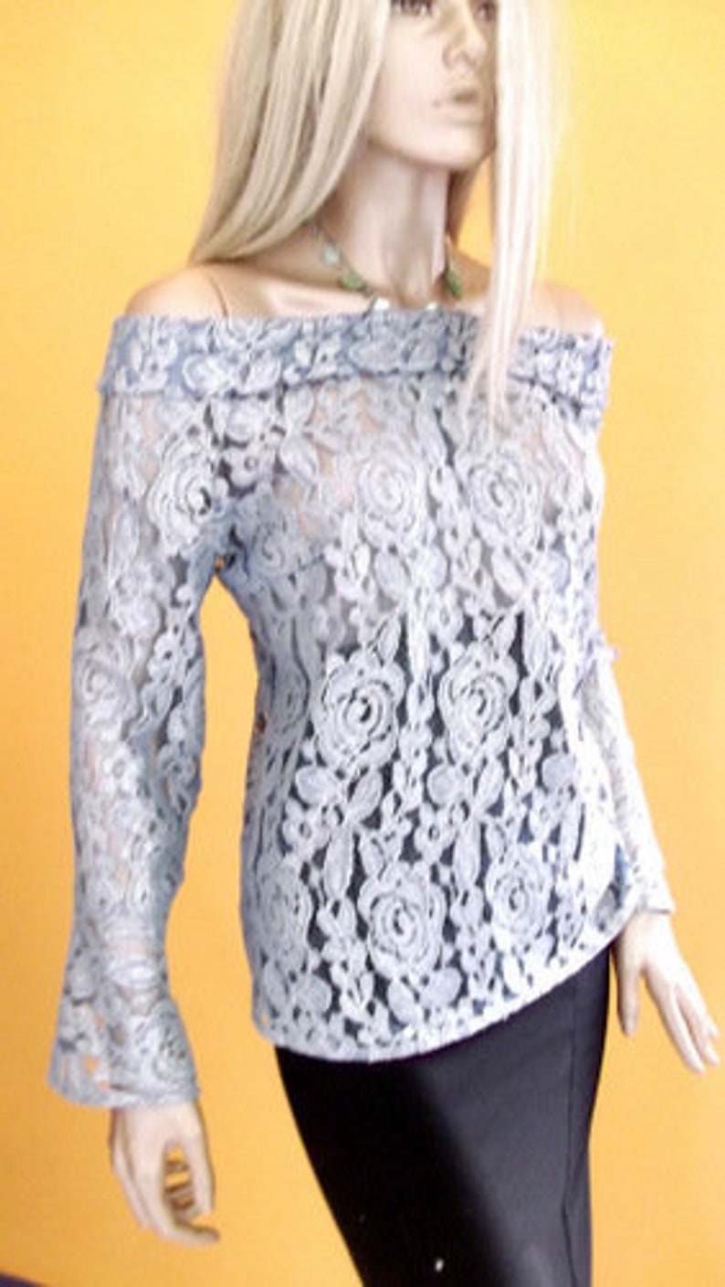 open back with long sleeves light blu lace shirt for woman