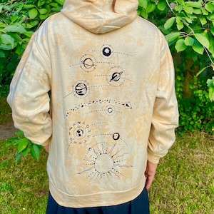 tie dye hoodie with planetary print and planet symbols. sweatshirt for psychedelic events like hippie goa, psytrance parties and festivals