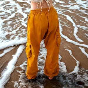 curcuma orange harem pants, bloomers, Aladdin pants, Goa pants for psychedelic events such as hippie Goa and psytrance parties and festivals