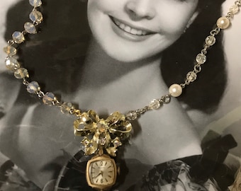 SAINT THERESE vintage assemblage upscaled watch bow necklace rosary beads faux pearls repurposed altered art mixed media