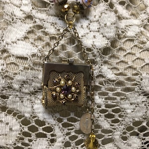 FLORAL PURSE BOUQUET purple pearl vintage assemblage mesh purse pendant charm necklace religious medallion altered art repurposed