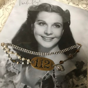 112 hotel tag medal vintage assemblage upscaled rhinestone charm repurposed bracelet altered art mixed media