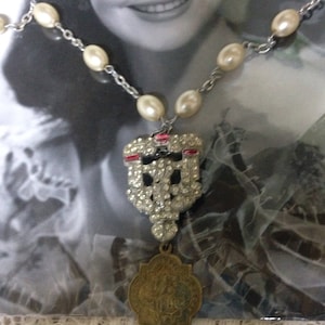 Rhinestone and red antique shoe clip vintage assemblage necklace religious pendang faux pearl chain altered art mixed media upscaled