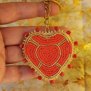 Portachiavi oro e cuore rosso/portachiavi per videogiochi
