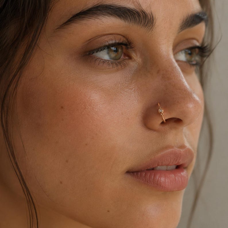 A close-up of a woman's face, focusing on her nose and lips.