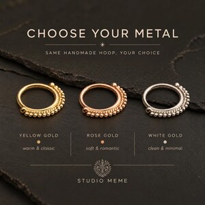 three different types of metal hoop earrings, each with a unique color and design, arranged on a dark background.