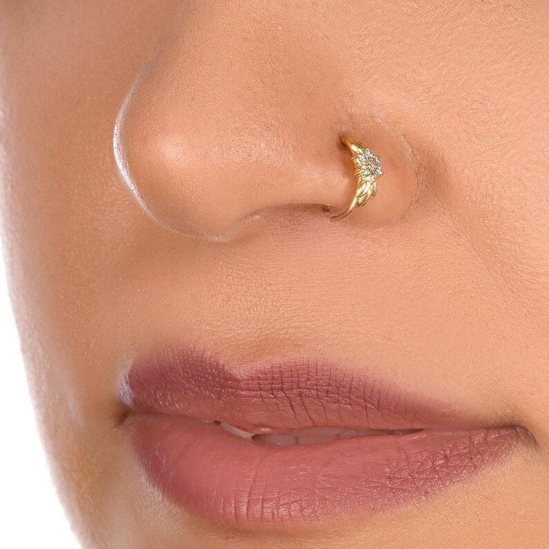 A close-up of a person's face, focusing on their nose and lips.