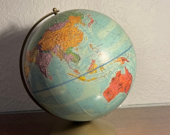 Vintage globe. Replogle stereo relief globe. 1960s globe. 13” diameter globe. Metal base and arm. Raised geography.