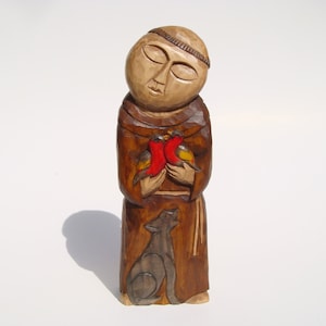 Sculpture en bois artisanale de Saint-FRANÇOIS avec un loup et un oiseau