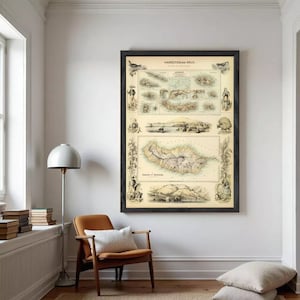 May include: A framed vintage map print with the text "HAMEDTEMAA-RRUS" at the top. The map features detailed illustrations and a sepia-toned colour palette, with a black frame. The print is displayed on a white wall.