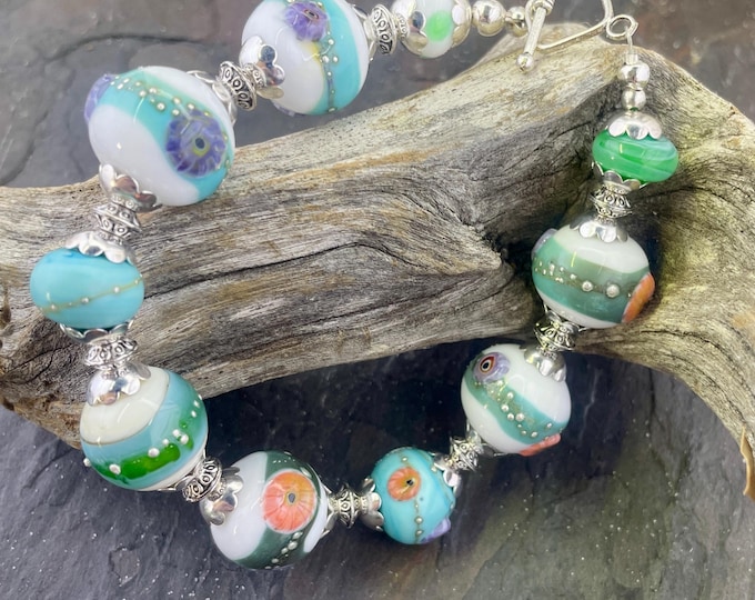 Turquoise Beach Bead glass  eight inch bracelet