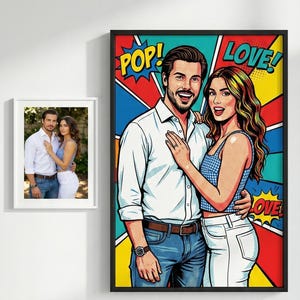 May include: A framed pop art style portrait of a couple, with the words "POP!" and "LOVE!" in speech bubbles. The man wears a white shirt and jeans, and the woman wears a blue gingham top and white pants. A smaller framed photo is also visible.