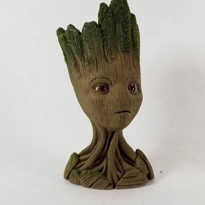 Hand sculpted teen Groot bust.