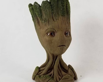 Hand sculpted teen Groot bust.