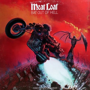 May include: Album cover for Meat Loaf's "Bat Out of Hell." The artwork depicts a motorcycle with a rider, a bat-like creature, and a graveyard set against a red backdrop. The album title and artist name are visible at the top of the image.