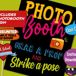 May include: A black sign with the text "PHOTO Booth" in yellow, pink, and blue lettering. The sign also includes the text "Grab a prop and strike a pose" in green and blue lettering. There are several colorful props in the image, including a speech bubble with the text "Reunited and it feels so good", a heart with the text "High School Sweethearts", a speech bubble with the text "Class Clown", and a purple speech bubble with the text "Instant Download".