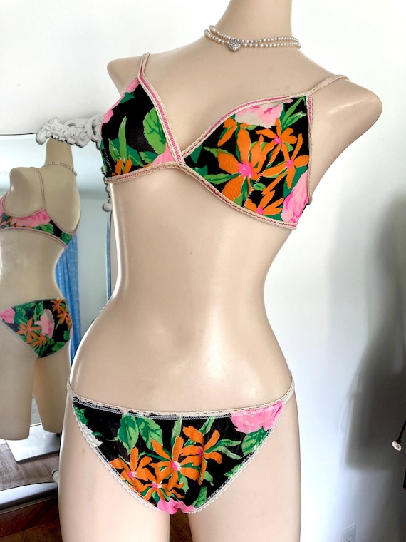 Vintage 1970s Black Floral Nylon String Bikini and Bra Set With An Orange Green and Bright Pink Botanical Print Size Small