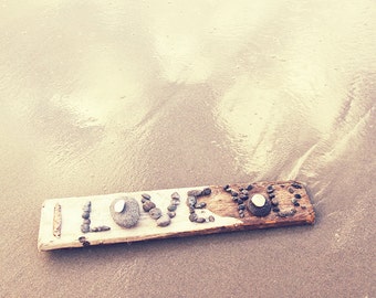 I love you. 1. written with stones on wood. Photographic Print.