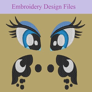 May include: Embroidery design files for a pair of cartoon eyes with eyelashes and wings. The eyes are blue with white pupils and black outlines. The wings are black with white crescent moons and black dots.