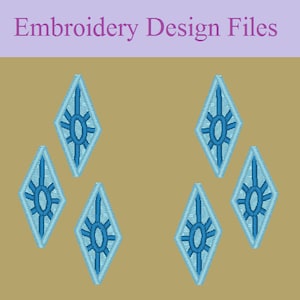 May include: Six blue diamond-shaped embroidery designs with a sunburst pattern inside each diamond. The designs are on a beige background.