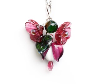 Bleeding heart flower lampwork pendant on silver findings and silver plated chain