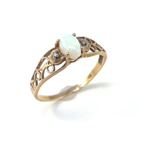 10K Opal and Diamond filigree design ring, size 7