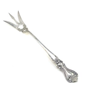 Sterling silver long handled and three tined serving fork, 8 3/4 inches