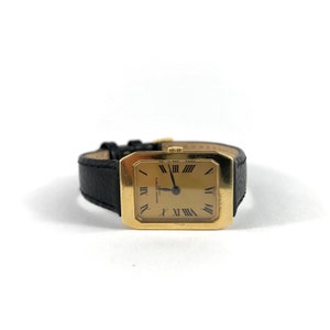 18K Vacheron Constantin Lady’s Wrist Watch, black leather band, original 18 K gold buckle, yellow gold watch, working