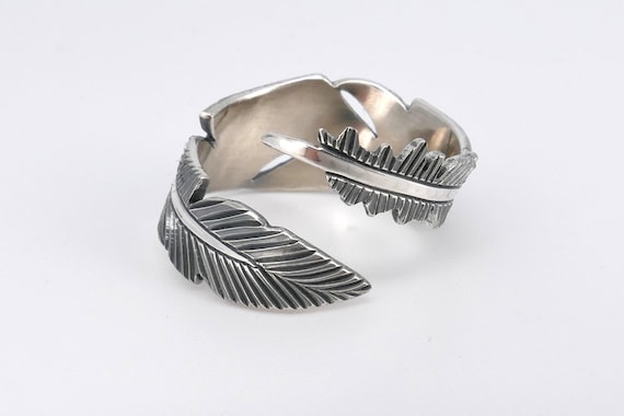 Adjustable silver feather ring deals