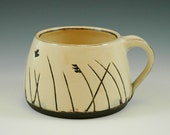 Handmade Black Clay Mug: Vanilla Glaze, Swedish Nature Design