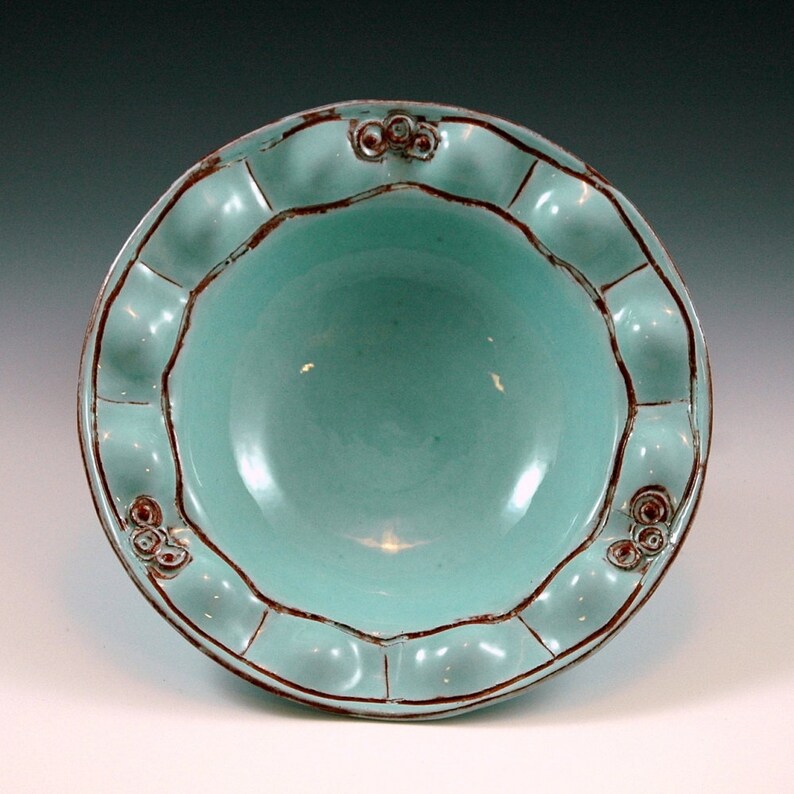 Small bowl turqouise colored.