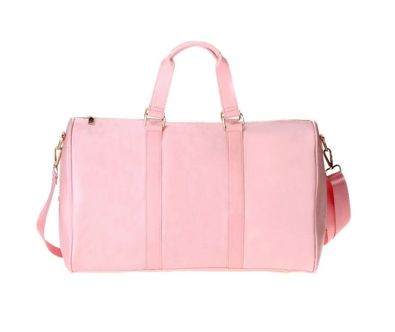 a pink bag with a handle on it