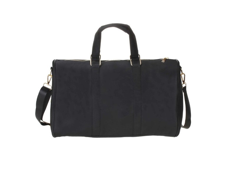 a black duffel bag on a white background