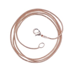 May include: A rose gold snake chain necklace with a lobster clasp closure. The chain is coiled and ready to be worn.
