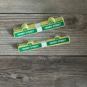 May include: A handmade wooden sign with the text "Welcome" in a playful font. The sign features a distressed white background and a dark brown frame, perfect for a front door or entryway.