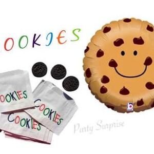 May include: A brown and white chocolate chip cookie balloon with a smiley face. The balloon is surrounded by four chocolate chip cookies and three white paper bags with the word "COOKIES" printed on them.
