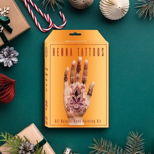 May include: A box of henna tattoo supplies with a hand with a henna tattoo on it. The box is orange and has the words "Henna Tattoos" on it. The text "All-Natural Body Painting Kit" is also on the box.