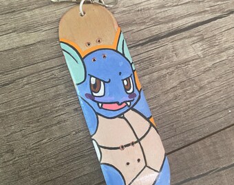 Hand painted anime mini skateboard keychain