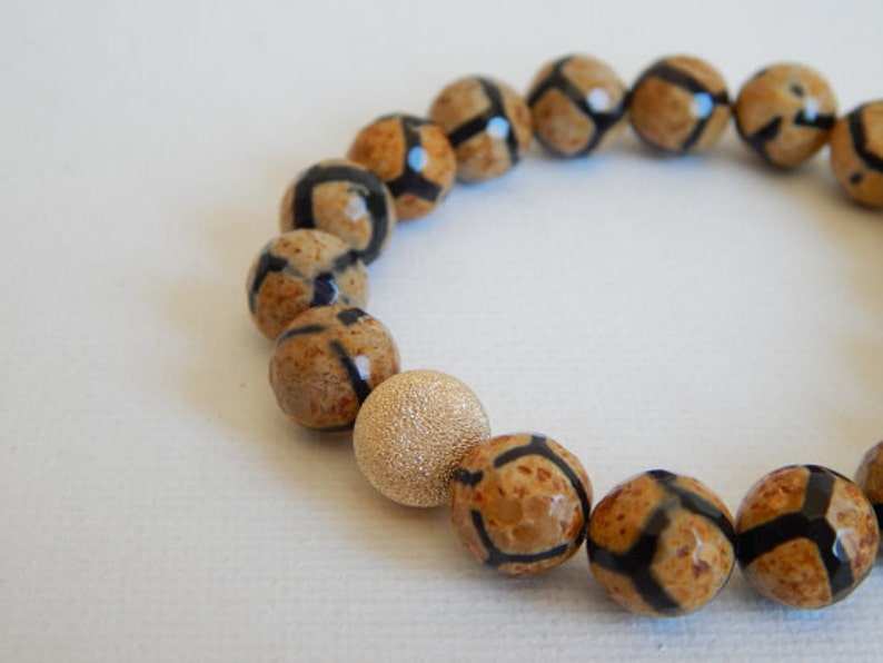stacking bracelet earthy colors Tan and black giraffe agate stretch bracelet with 14kt gold filled stardust bead fall fashion rustic