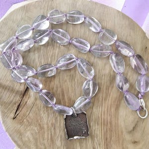 Hand knotted amethyst with artisan sterling silver charm, boho necklace, gift for her