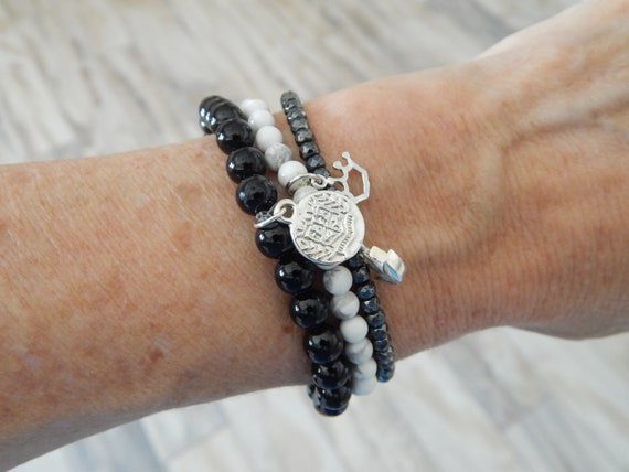 Black tourmaline stretch bracelet with sterling silver coin charm, black and white, boho chic, trendy jewelry