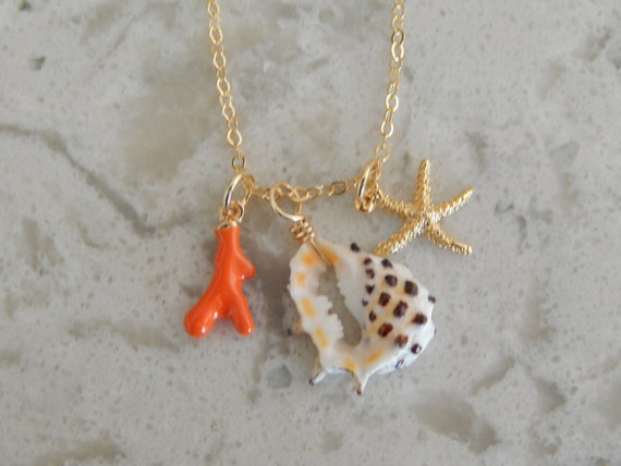 Seashell necklace with gold plated starfish charm, summer necklace layering necklace, multi charm necklace