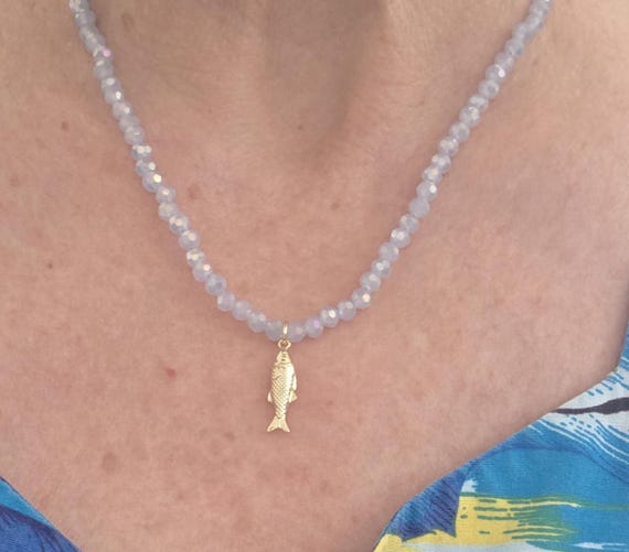 Faceted blue crystal beads with gold plated fish pendant, summer necklace