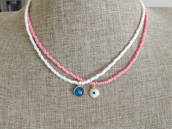 Dainty seed bead necklace with glass evil eye charm, layering necklace, gift for her