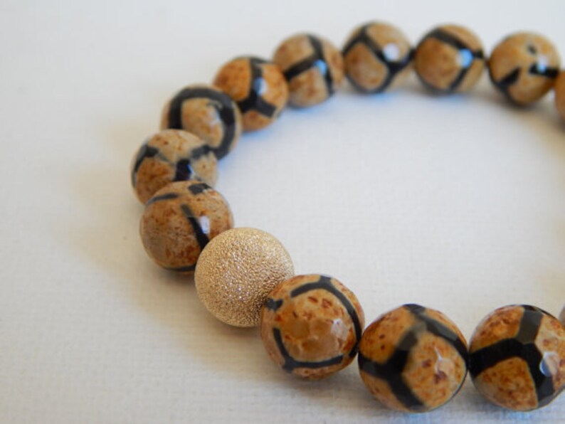 stacking bracelet earthy colors Tan and black giraffe agate stretch bracelet with 14kt gold filled stardust bead fall fashion rustic