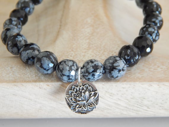 Black snowflake obsidian stretch bracelet with sterling silver lotus charm, black and white bracelet, boho chic, trendy jewelry, zen jewelry