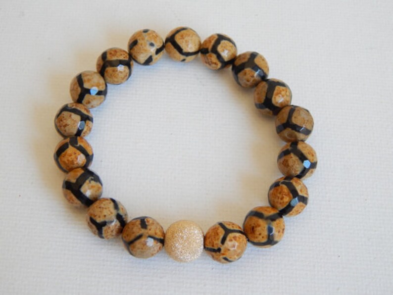 stacking bracelet earthy colors Tan and black giraffe agate stretch bracelet with 14kt gold filled stardust bead fall fashion rustic