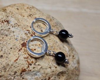 Shungite huggie hoop earrings. Sterling silver October birthstone. Black Reiki jewelry uk. Minimalist earring. earrings for women