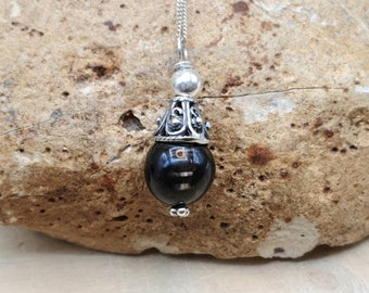 Minimalist Hypersthene cone pendant. Reiki jewelry uk. Black semi precious stone. 10mm stone. Bali silver necklaces for women.